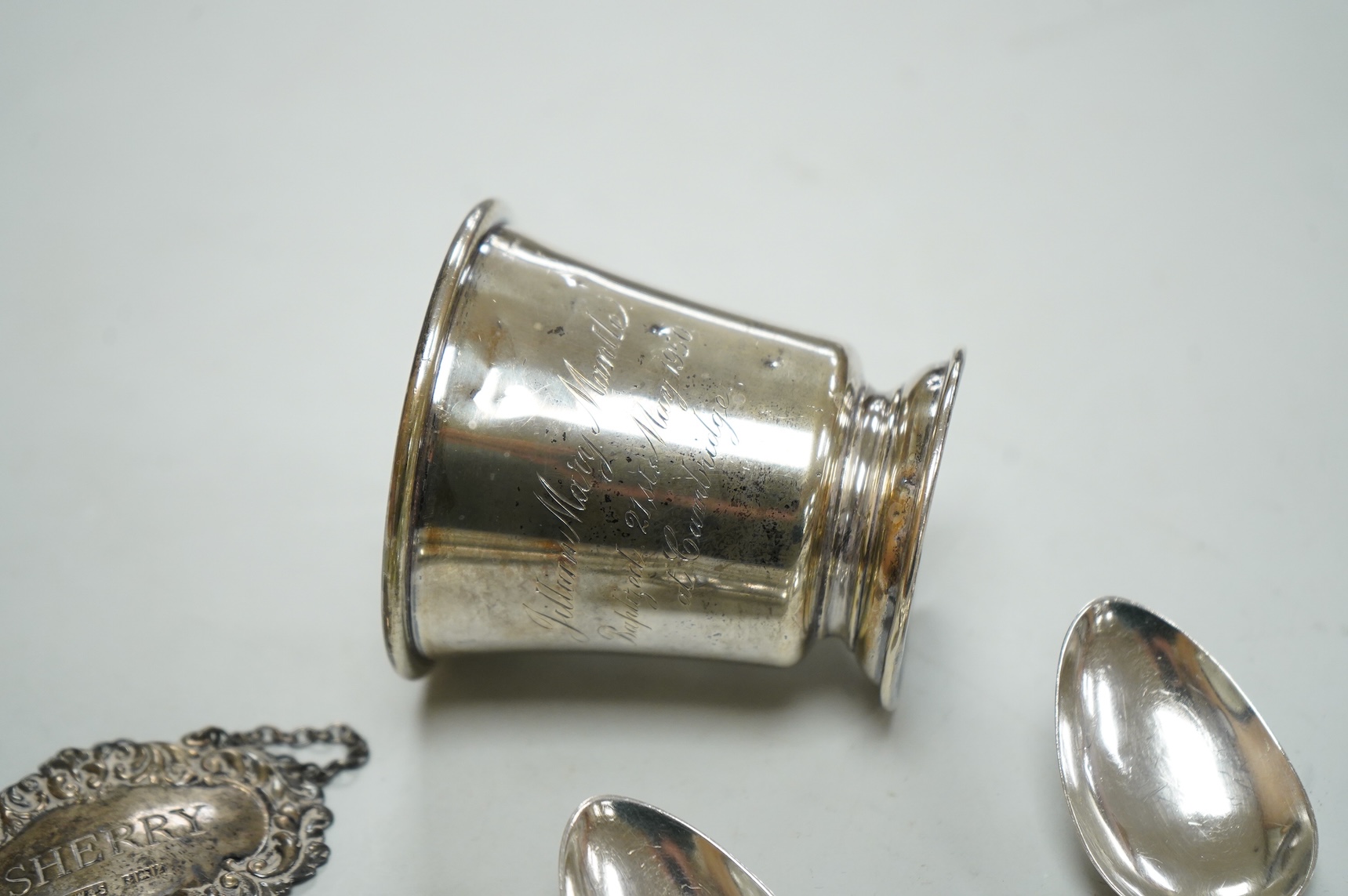 A collection of silver to include a set of six George IV silver Kings pattern teaspoons, by William Eaton, London 1824/5, five other items of silver flatware, a small trophy cup, christening mug and wine label, 13oz.